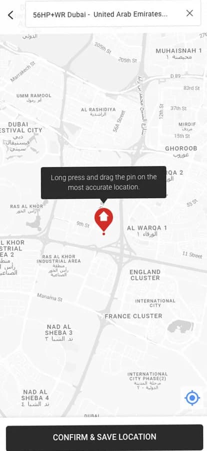 Delivery location map with the hint 'Long press and drag the pin on the most accurate location' and a Confirm & Save Location button.